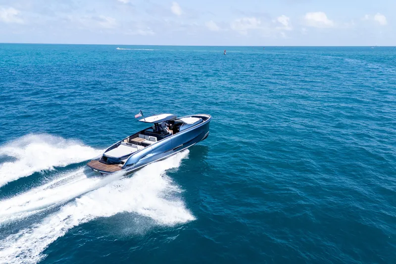 Slide: The Image of 2023 Solaris Power 44 Open yacht cruising on open blue sea. - 25