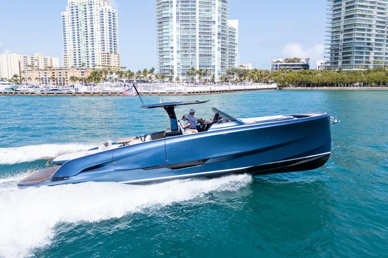 Slide: The Image of 2023 Solaris Power 44 Open yacht cruising in vibrant coastal waters. - 32