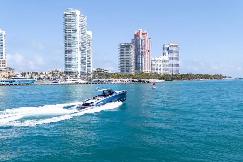 Slide: The Image of 2023 Solaris Power 44 Open yacht cruising near city skyline and waterfront. - 33