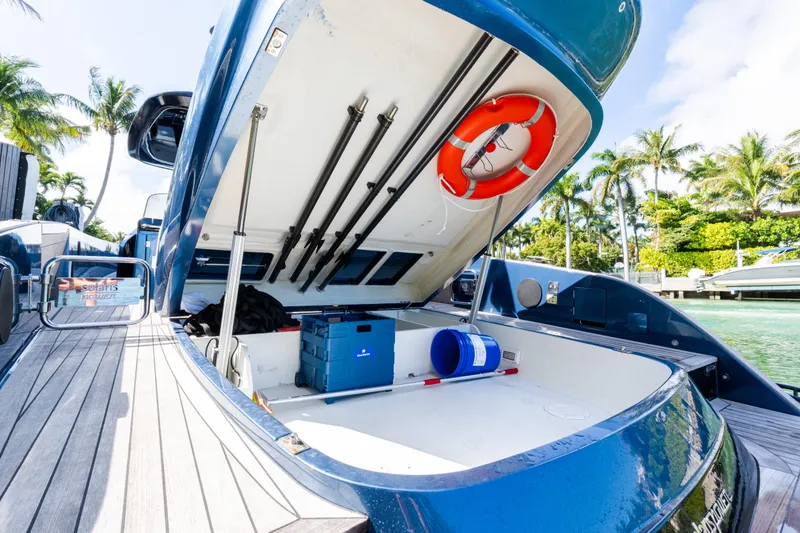 Slide: The Image of 2023 Solaris Power 44 Open yacht storage area with life preserver and equipment. - 37