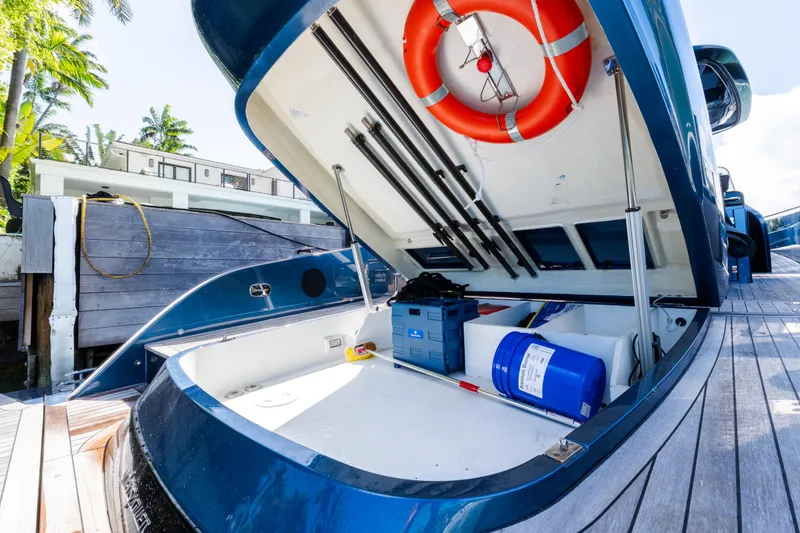 Slide: The Image of 2023 Solaris Power 44 Open yacht storage compartment with life preserver and equipment. - 40