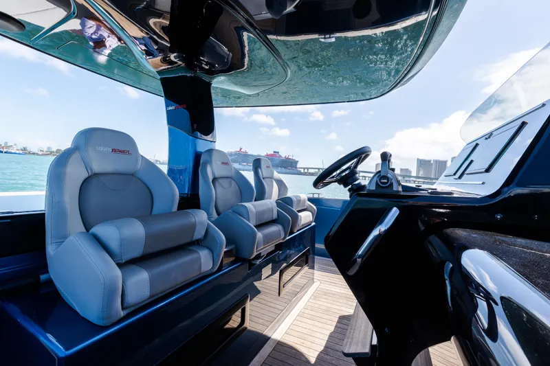 Slide: The Image of Interior view of 2023 Solaris Power 44 Open yacht with luxurious seating and helm. - 45