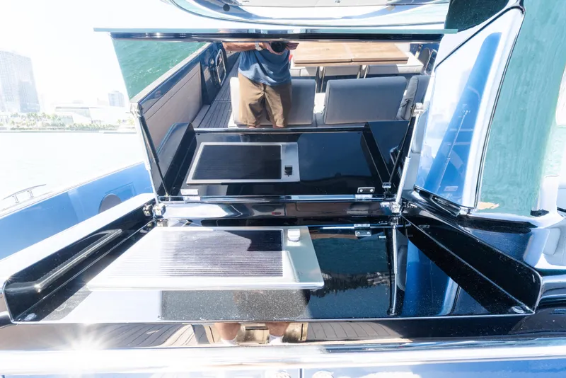 Slide: The Image of 2023 Solaris Power 44 Open yacht with sleek, modern interior and reflective surfaces. - 55