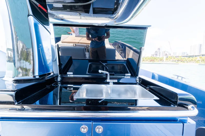 Slide: The Image of 2023 Solaris Power 44 Open yacht with sleek outdoor kitchen and sink. - 56