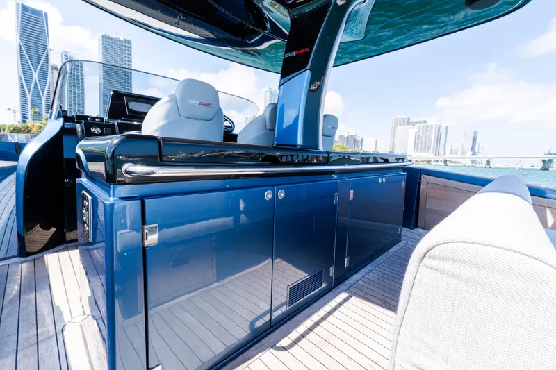 Slide: The Image of 2023 Solaris Power 44 Open yacht interior with sleek blue cabinetry and modern design. - 58