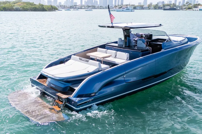 Slide: The Image of 2023 Solaris Power 44 Open yacht cruising on clear blue water. - 7