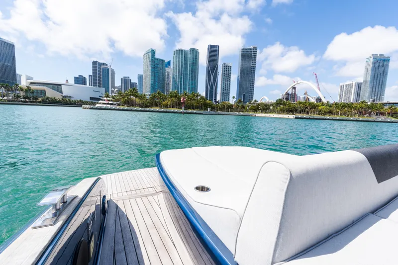 Slide: The Image of 2023 Solaris Power 44 Open yacht with city skyline and waterfront view. - 70