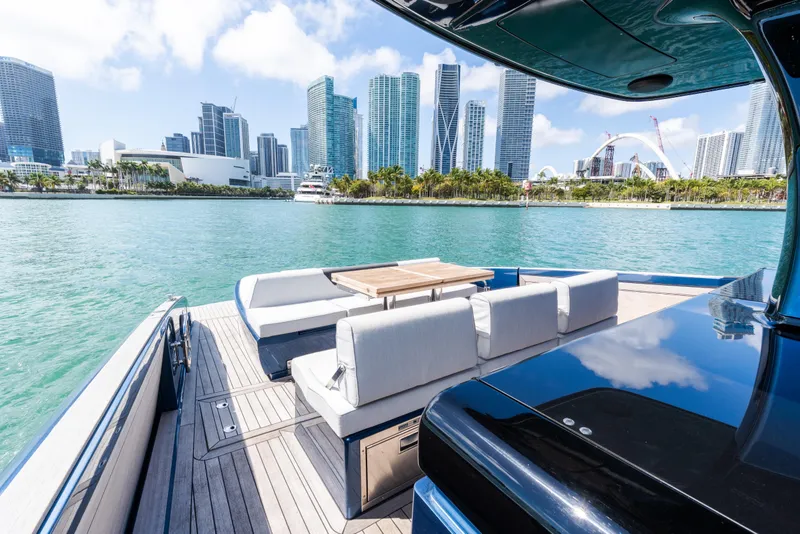 Slide: The Image of Luxurious 2023 Solaris Power 44 Open yacht with city skyline view. - 78