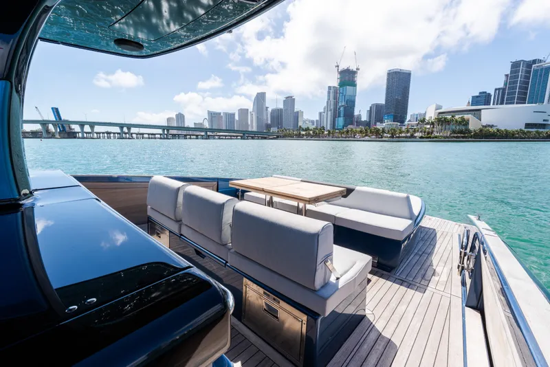 Slide: The Image of Luxurious 2023 Solaris Power 44 Open yacht with city skyline view. - 79
