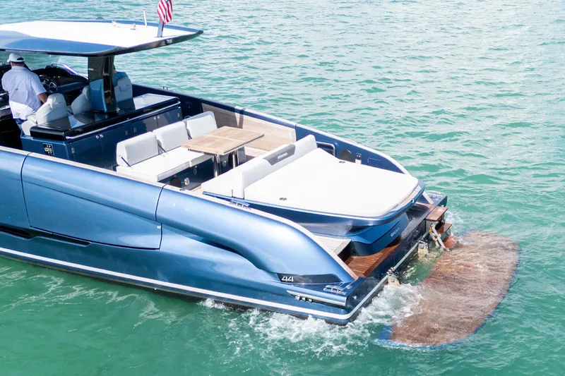 Slide: The Image of 2023 Solaris Power 44 Open yacht cruising on clear blue water. - 8