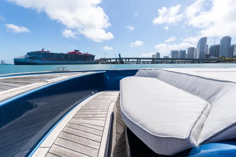 Slide: The Image of 2023 Solaris Power 44 Open yacht with city skyline and cruise ship in background. - 80