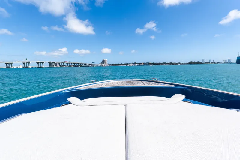 Slide: The Image of 2023 Solaris Power 44 Open yacht cruising on clear blue waters under a sunny sky. - 82