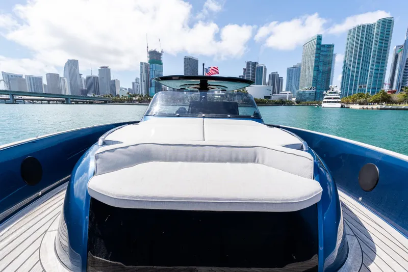 Slide: The Image of 2023 Solaris Power 44 Open yacht cruising near city skyline, sunny day. - 85