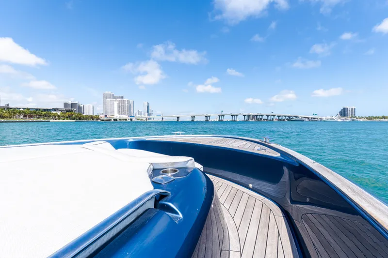 Slide: The Image of 2023 Solaris Power 44 Open yacht cruising near city skyline and bridge. - 86