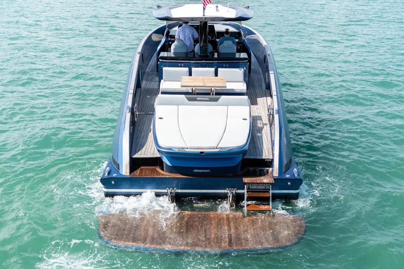 Slide: The Image of 2023 Solaris Power 44 Open yacht cruising on clear blue water. - 9
