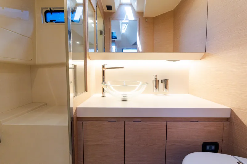 Slide: The Image of Luxurious bathroom interior of 2023 Solaris Power 44 Open yacht, featuring modern fixtures and elegant design. - 96