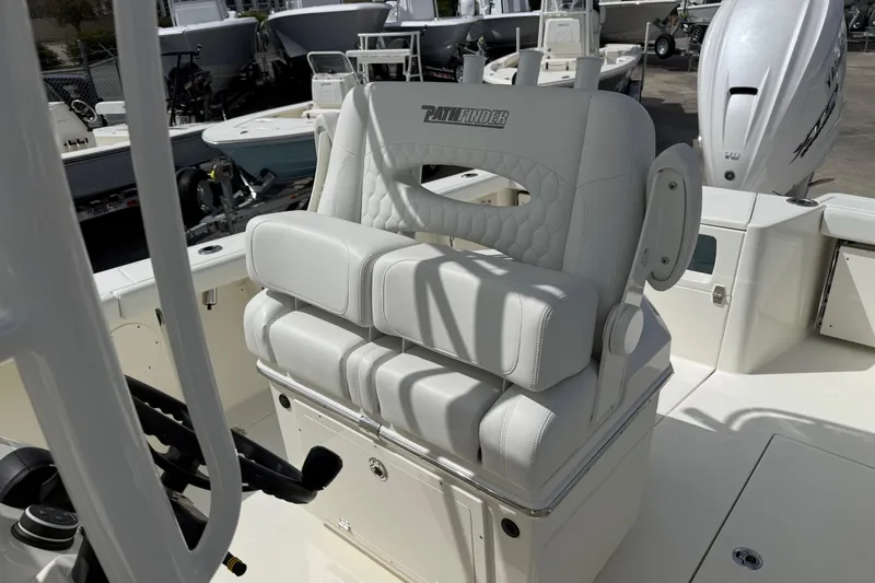 Slide: The Image of 2026 Pathfinder 2700 Open boat with luxurious white seating and modern design. - 12