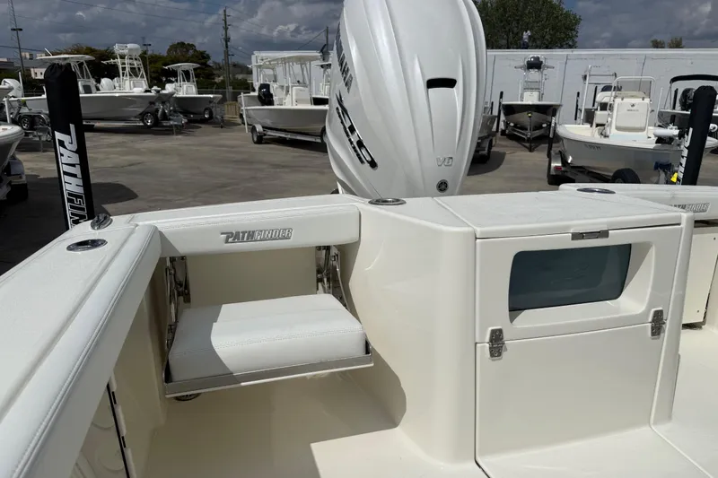 Slide: The Image of 2026 Pathfinder 2700 Open boat interior with seating and storage compartments. - 16