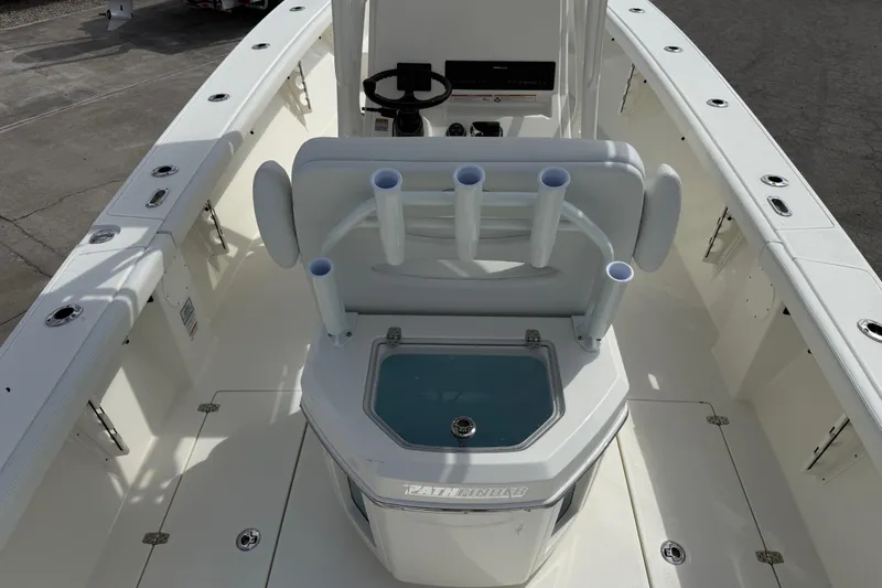 Slide: The Image of 2026 Pathfinder 2700 Open boat interior with rod holders and console. - 8