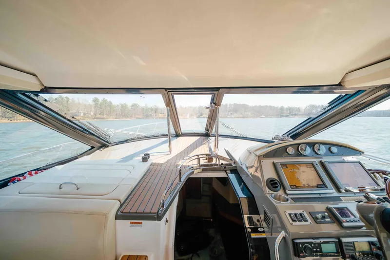 Slide: The Image of Interior view of 2012 Regal 46 Sport Coupe yacht cockpit with navigation displays. - 40