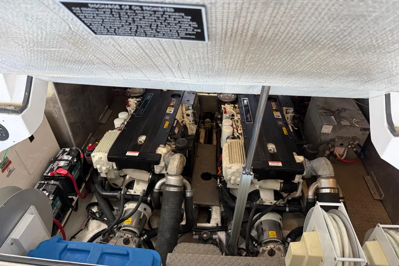 Slide: The Image of Engine room of 2012 Regal 46 Sport Coupe with dual engines and equipment. - 6