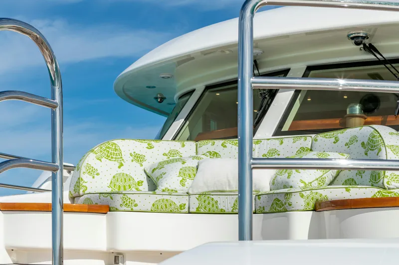 Slide: The Image of Luxurious 2010 Burger Custom yacht with turtle-patterned cushions and sleek railing. - 50