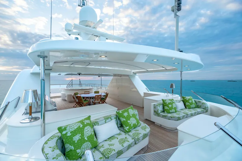 Slide: The Image of Luxurious 2010 Burger Custom yacht deck with elegant seating and ocean view. - 52
