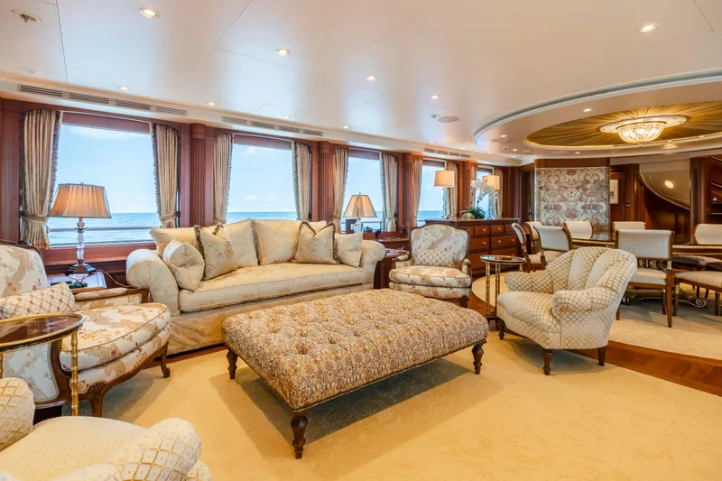 Slide: The Image of Luxurious yacht interior with elegant seating, large windows, and ocean view, Burger Custom 2010. - 6