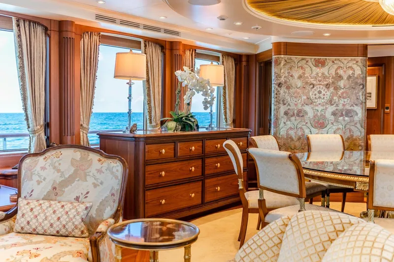Slide: The Image of Luxurious yacht interior with elegant furnishings, ocean view, and ornate decor. Burger Custom 2010. - 8