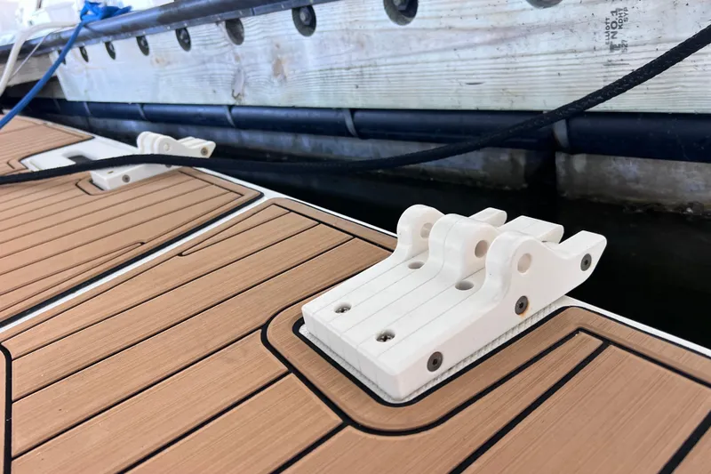 Slide: The Image of 2017 Sea Ray Sundancer 400 deck with cleat, docked at marina. - 16