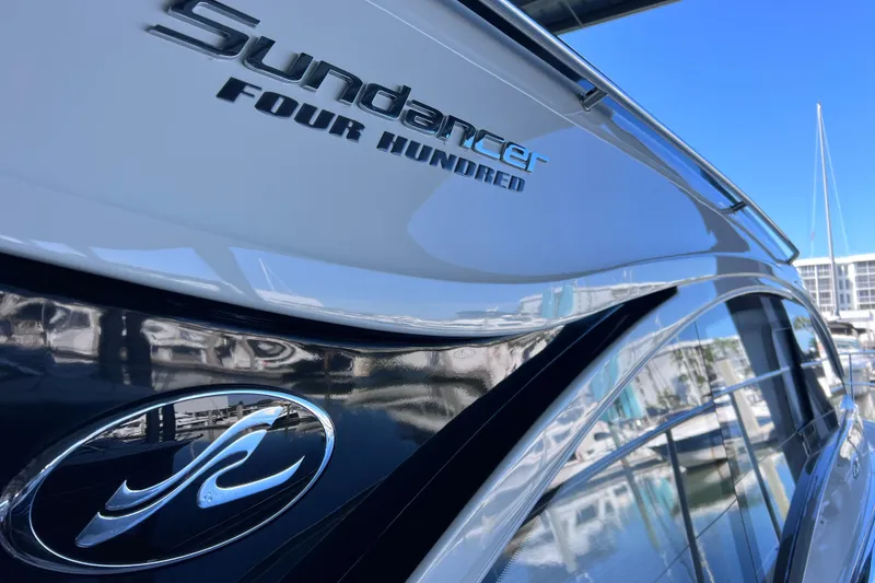 Slide: The Image of 2017 Sea Ray Sundancer 400 yacht with sleek design and reflective surface. - 21