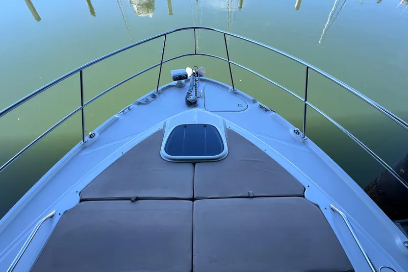 Slide: The Image of Bow view of 2017 Sea Ray Sundancer 400 yacht with sunpad and railing. - 27