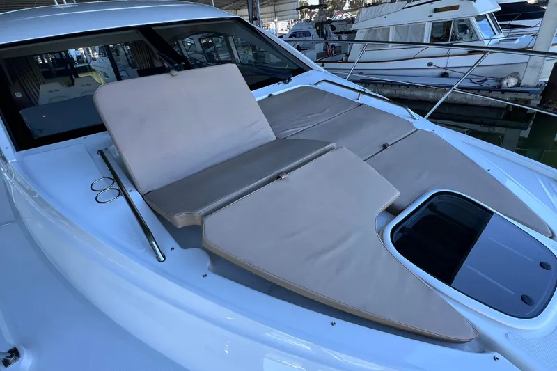 Slide: The Image of 2017 Sea Ray Sundancer 400 yacht with sunpad and hatch on deck. - 29