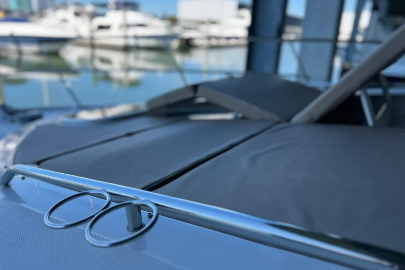 Slide: The Image of 2017 Sea Ray Sundancer 400 yacht with sleek deck design at marina. - 31