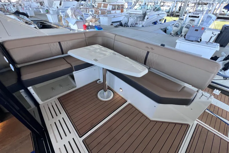 Slide: The Image of 2017 Sea Ray Sundancer 400 yacht with elegant seating and table on deck. - 35