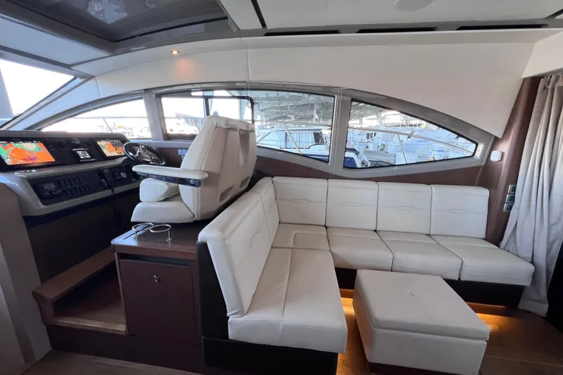 Slide: The Image of Luxurious interior of 2017 Sea Ray Sundancer 400 yacht with white leather seating. - 40