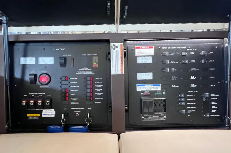 Slide: The Image of Electrical control panel on a 2017 Sea Ray Sundancer 400 yacht. - 44