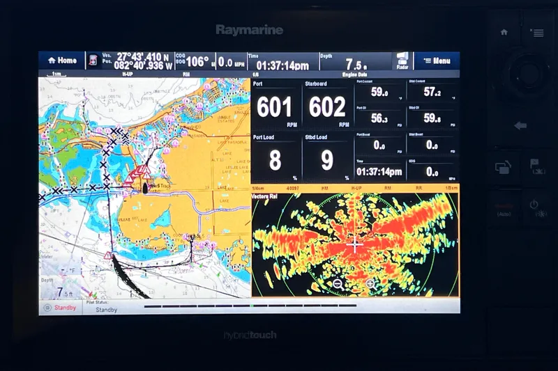 Slide: The Image of Navigation display on a 2017 Sea Ray Sundancer 400, showing maps and engine data. - 56