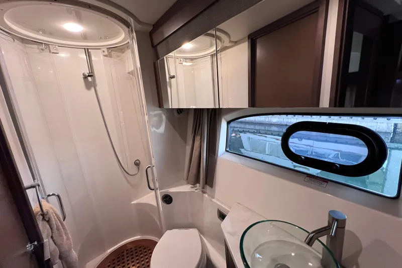 Slide: The Image of Luxurious bathroom in 2017 Sea Ray Sundancer 400 yacht with shower and modern fixtures. - 68