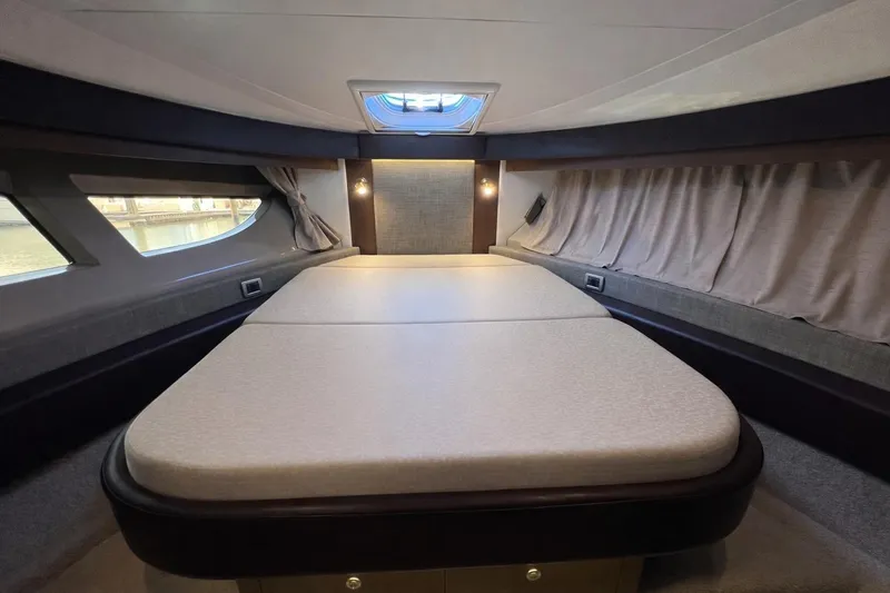 Slide: The Image of Luxurious interior cabin of 2017 Sea Ray Sundancer 400 yacht with elegant bedding. - 69