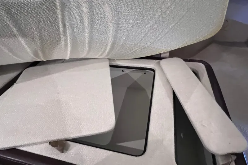 Slide: The Image of Interior storage compartment of 2017 Sea Ray Sundancer 400 yacht with cushioned seating. - 84