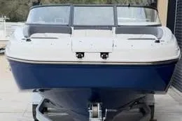 Slide: The Image of 2022 Bayliner DX 2250 boat on trailer, front view. - 8