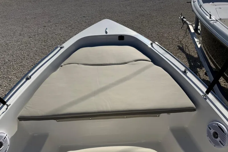 Slide: The Image of 2026 Key West 1720 Center Console boat with cushioned bow seating. - 11