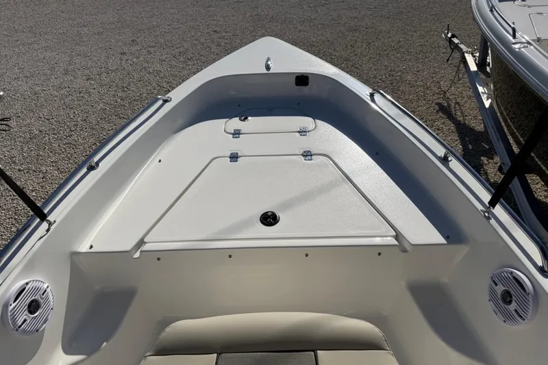 Slide: The Image of 2026 Key West 1720 Center Console boat interior with storage compartments. - 12