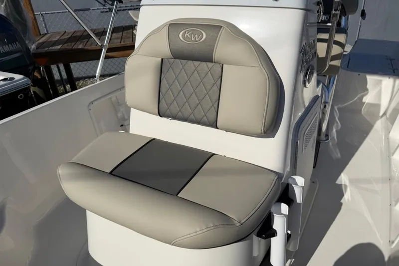 Slide: The Image of 2026 Key West 1720 Center Console boat seat with gray and beige upholstery. - 18