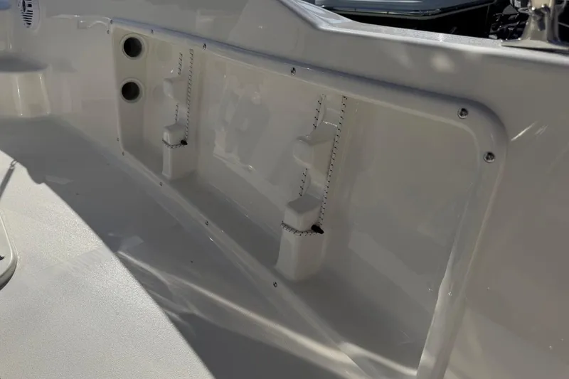 Slide: The Image of 2026 Key West 1720 Center Console boat interior detail with storage compartments. - 24