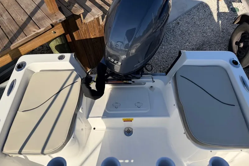 Slide: The Image of 2026 Key West 1720 Center Console boat with Yamaha 90 engine, rear seating view. - 8