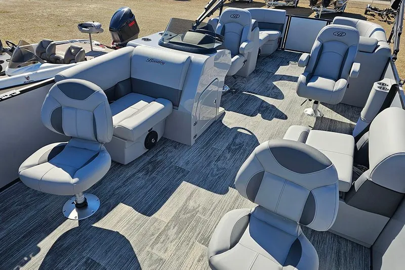 Slide: The Image of 2026 Bentley Pontoons 243 Fish CWT interior with luxurious seating and modern design. - 11