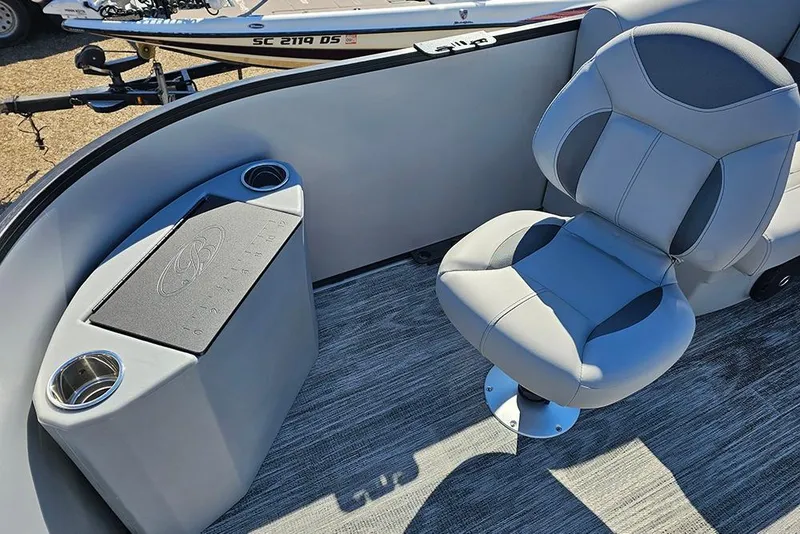 Slide: The Image of 2026 Bentley Pontoons 243 Fish CWT interior with swivel seat and cup holders. - 12