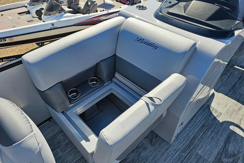 Slide: The Image of 2026 Bentley Pontoons 243 Fish CWT seat with storage and cup holders. - 14